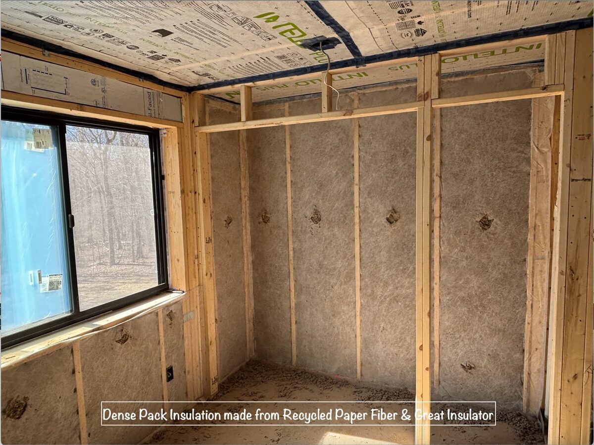 Framed and insulated wall around a new window opening
